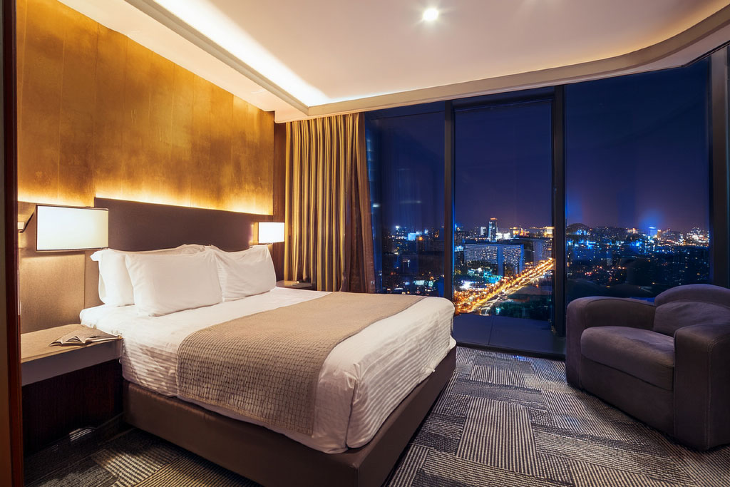 Hotel room door, privacy latch, and security icon representing in-room safety