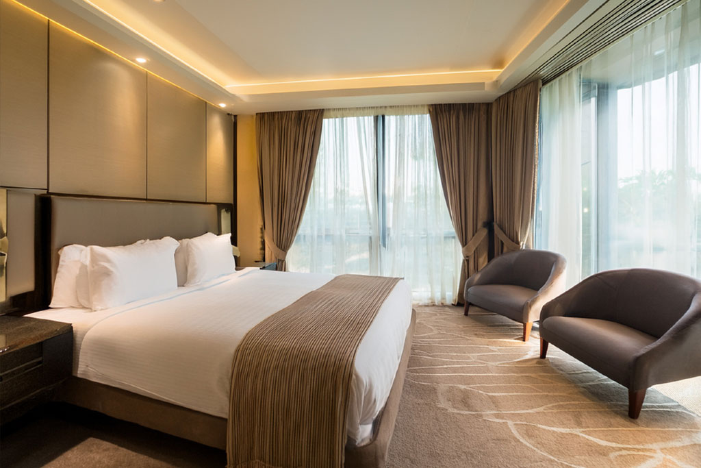 Four pillars graphic representing elite cast, privacy management, hygiene protocols, and English support